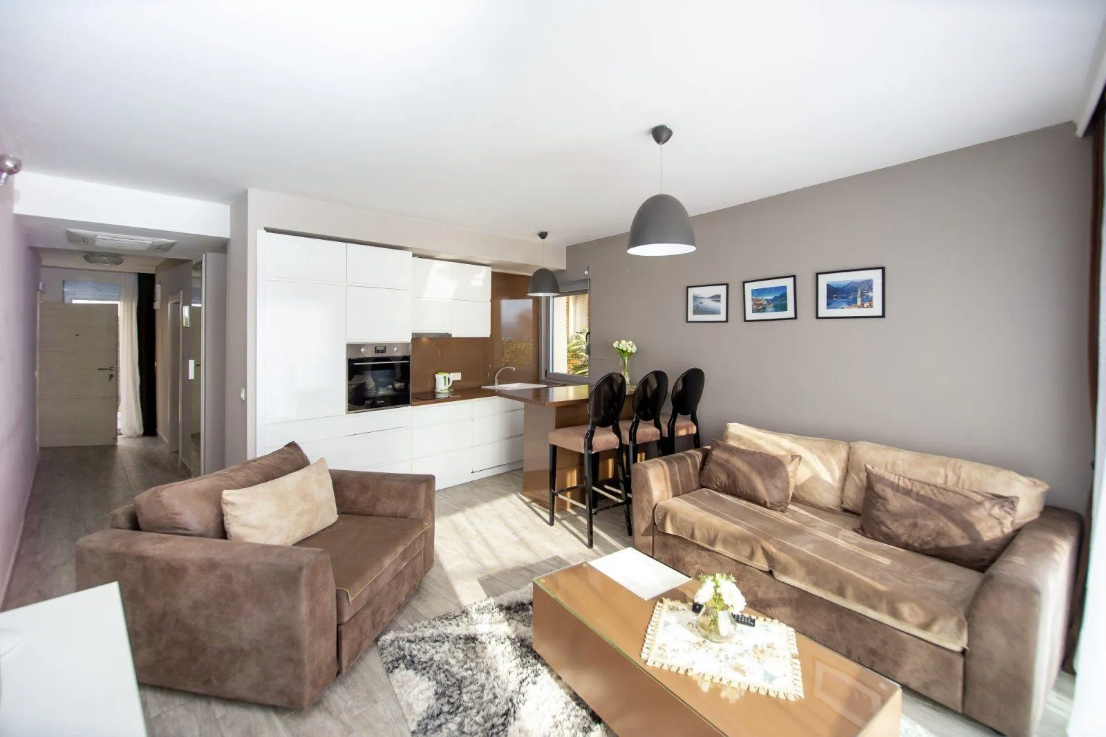 Spacious living room connected to the dining area and kitchen.
