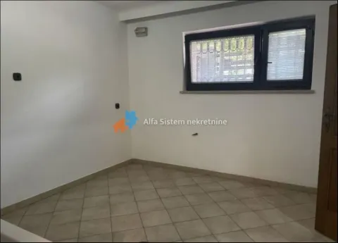 Empty room with ceramic floor tiles and a single window. - image 6