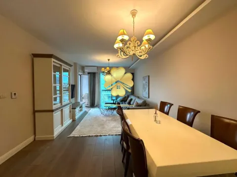 Spacious living room with a dining area and seating set. - image 4