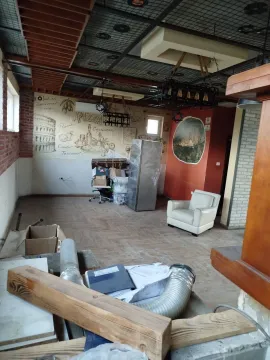Interior of a spacious room undergoing renovation. - image 5