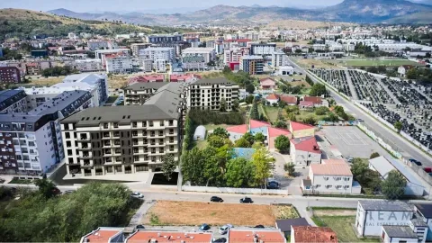 Aerial view of the new building and surrounding neighborhood. - image 4