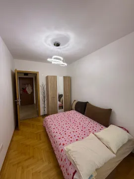 Bedroom with a double bed, wardrobe, and wooden flooring. - image 9