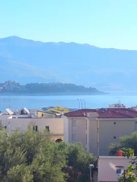 View of the sea and surrounding buildings from the terrace. - image 19