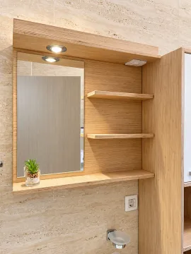 Wooden unit with mirror and shelves in the bathroom. - image 8