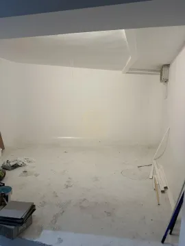 Empty room during renovation with white walls. - image 12