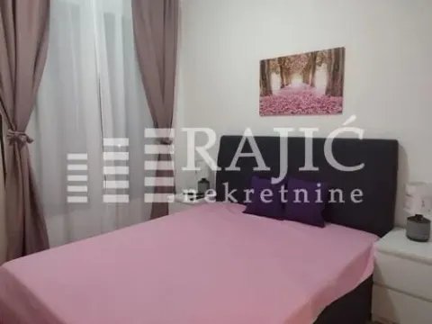 Furnished bedroom with a double bed. - image 5