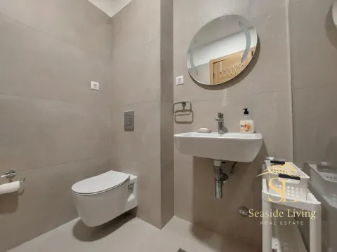 Modern equipped bathroom in neutral tones. - image 15
