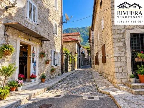 A street in the old town with stone houses and cobblestone pavement. - image 3
