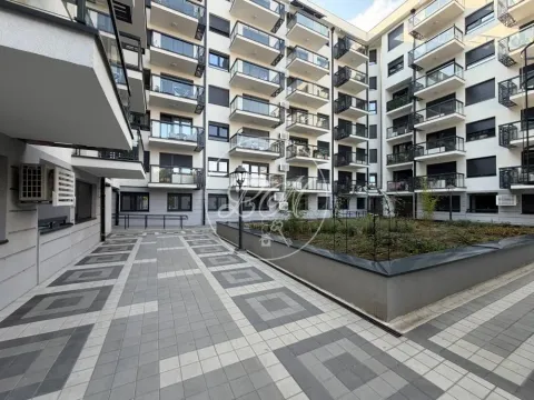 View of the courtyard and the facade of the residential building with balconies. - image 15