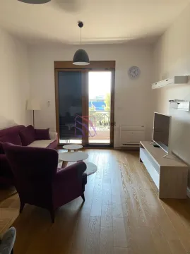 Living room with sofa, TV and access to the terrace. - image 4