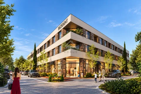 Spoljašnji izgled moderne stambeno-poslovne zgrade sa uređenim okruženjem i trotoarom. - image 3