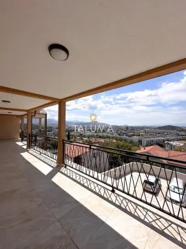 Spacious covered terrace with a view of the city and surroundings. - image 20