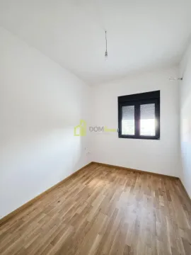 Empty room with white walls, wooden flooring and a window. - image 5