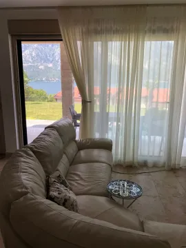 Living room with leather sofa and view of the terrace and sea. - image 7