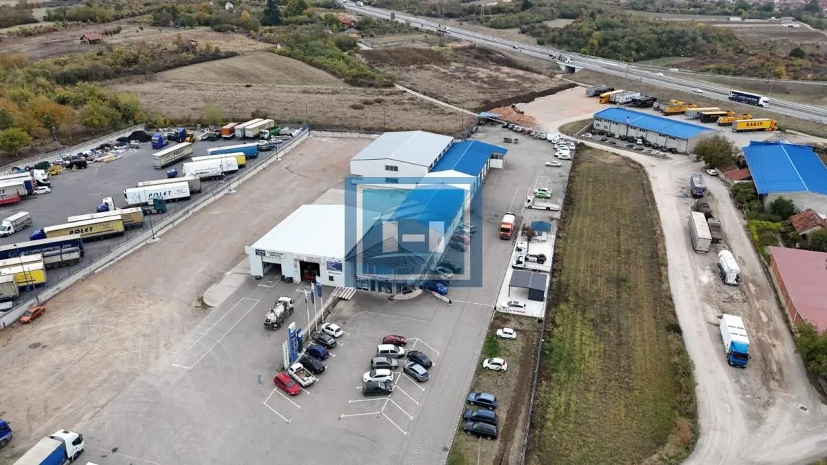 Aerial view of the business complex with warehouses and parking for freight vehicles.