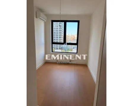Empty room with parquet flooring and an air conditioning unit. - image 14