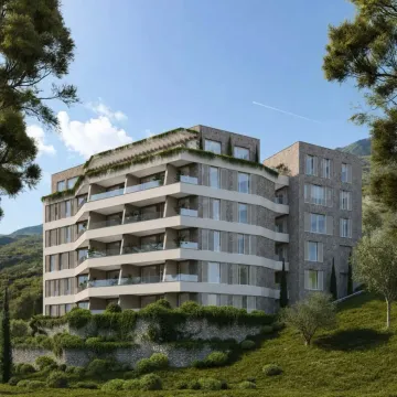 Spoljašnji izgled moderne stambene zgrade okružene zelenilom i planinskim pejzažom. - image 3