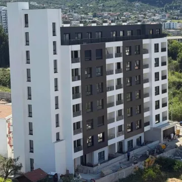 Elevated view of the exterior of a modern residential building. - image 2