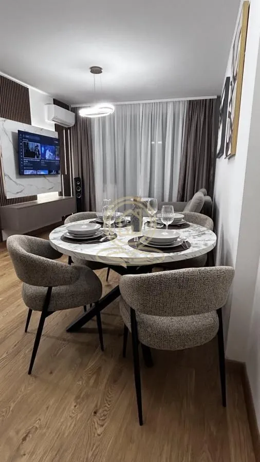 Living room with a dining table and chairs.