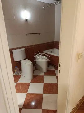 Bathroom equipped with a toilet, bidet, and bathtub. - image 12