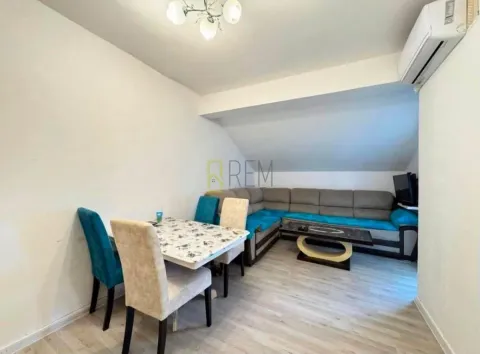 Living room with a sofa set and dining table. - image 5