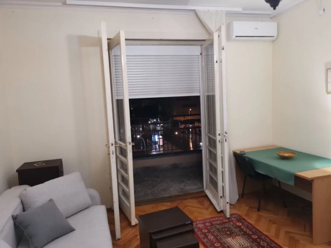 Living room with access to a balcony.