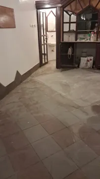 Property interior in poor condition with ceramic floor tiles. - image 11