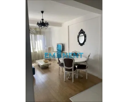 Living room with dining area, hardwood floors, and traditional furniture. - image 4