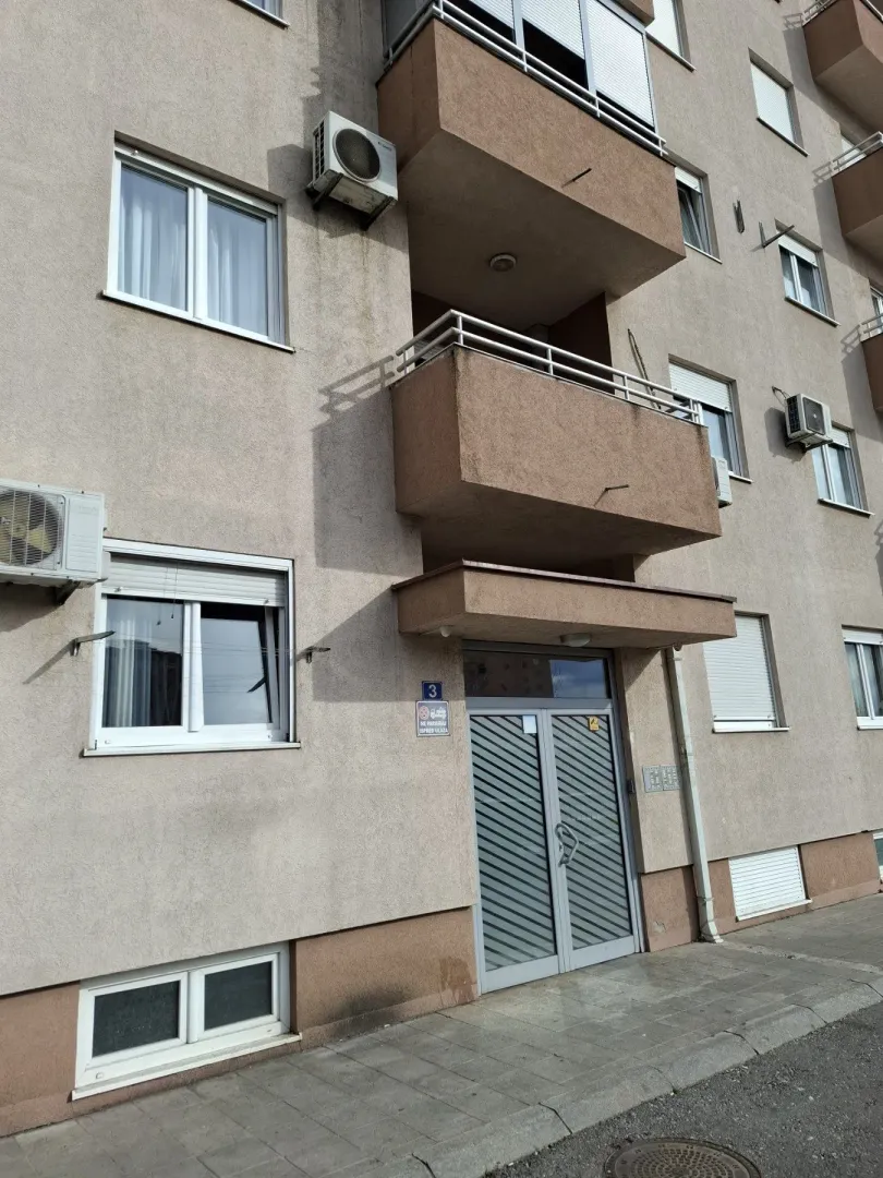Exterior view of a residential building entrance.