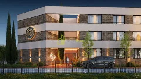 Exterior view of a modern residential building with a landscaped yard and fence. - image 8