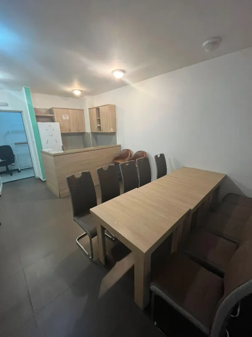 Kitchen with dining table and chairs.