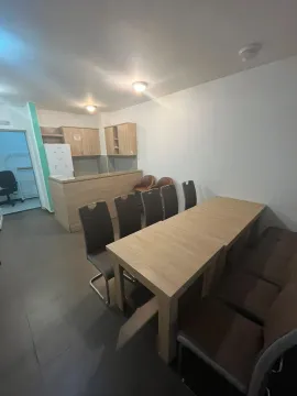 Kitchen with dining table and chairs. - image 7