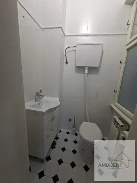 Small bathroom with white tiles and sanitary ware. - image 12