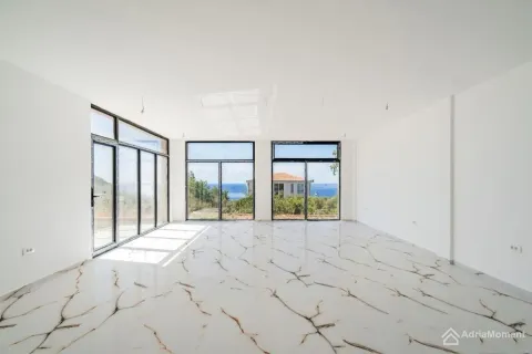 Empty living room with large glass surfaces and a sea view. - image 5