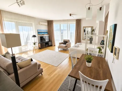 Spacious bright living room with dining area and access to the terrace. - image 2