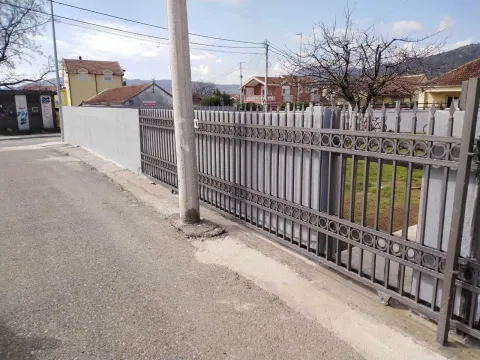 Metal gate and fence around the house yard. - image 22