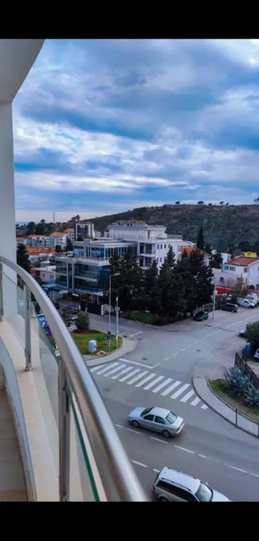 View of the surroundings and street from the building balcony.