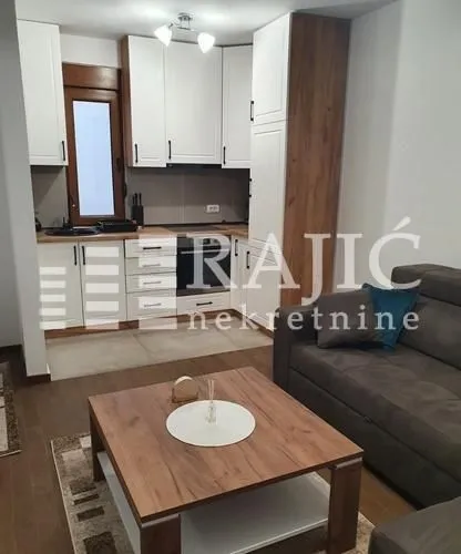 Living room connected to the kitchen.