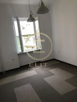 Empty room with a window and ceiling lights. - image 12