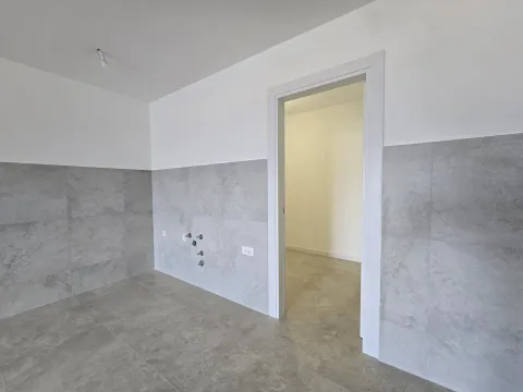 Unfurnished room with ceramic tiles and a doorway. - image 6