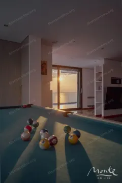 Living room with a billiard table and sea view. - image 11