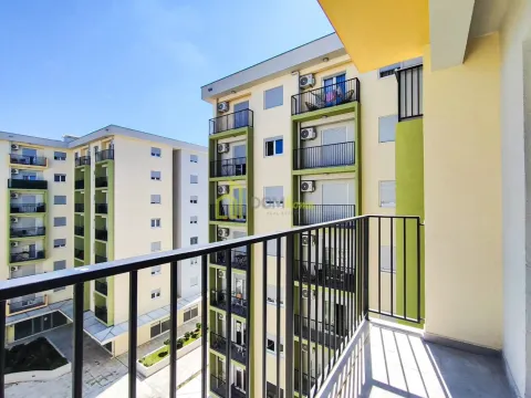 View from the balcony overlooking surrounding residential buildings. - image 4