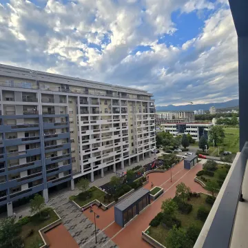 View from the terrace overlooking the neighborhood and surrounding buildings. - image 11