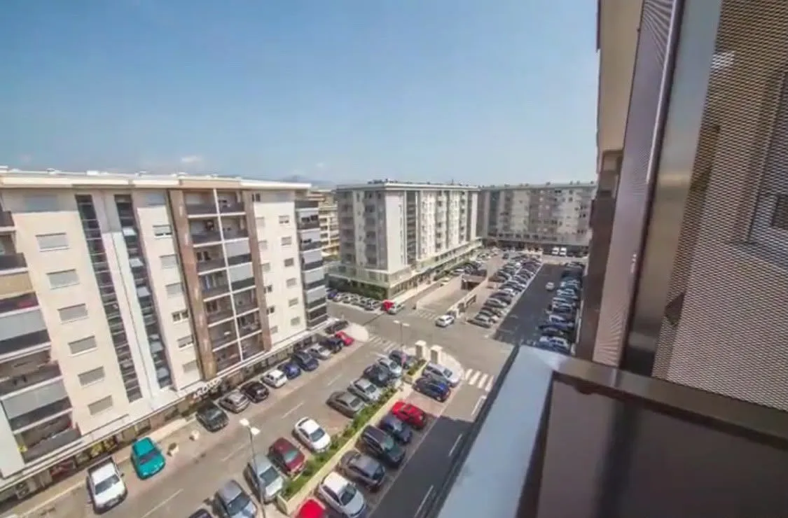 View from the terrace on the neighborhood and parking lot.