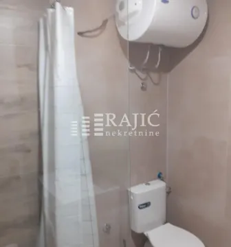 View of a modernly equipped bathroom with a shower cabin. - image 8