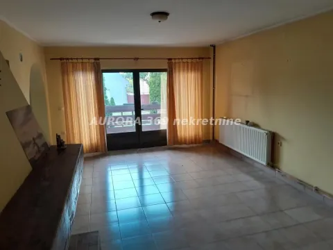 Empty living room with ceramic floor tiles and access to the terrace. - image 8
