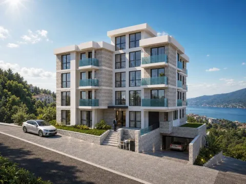 Spoljašnji izgled moderne stambene zgrade sa garažom i pogledom na more. - image 3