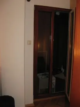 View of a balcony door from inside the room. - image 4