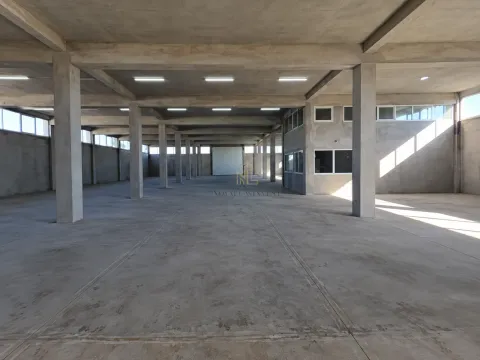 Empty industrial space in grey phase with concrete pillars. - image 2