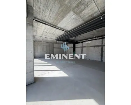 Unfinished space under construction with concrete pillars and ceiling. - image 4